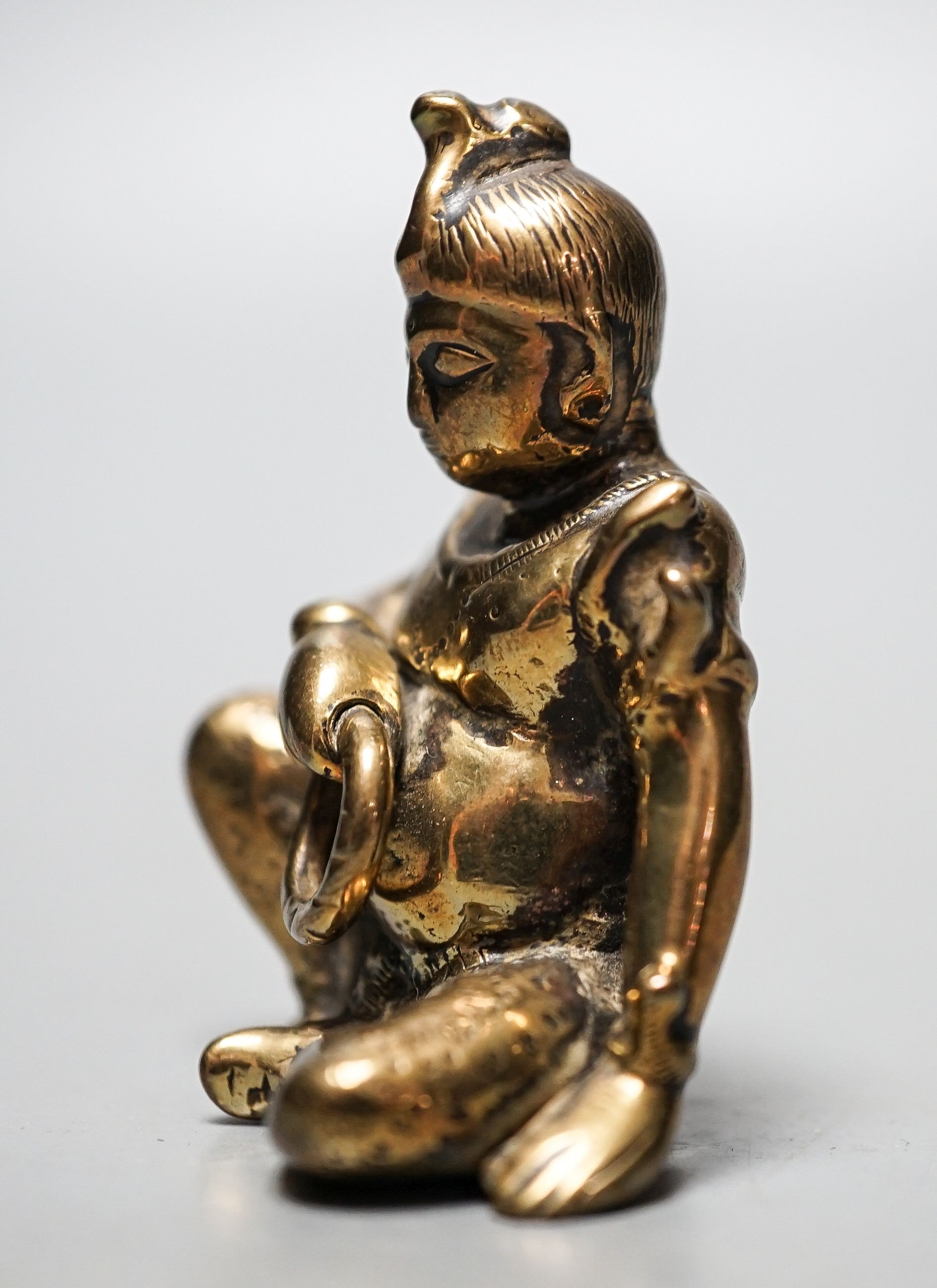A 19th century bronze Buddhist seated figure 5.5cm